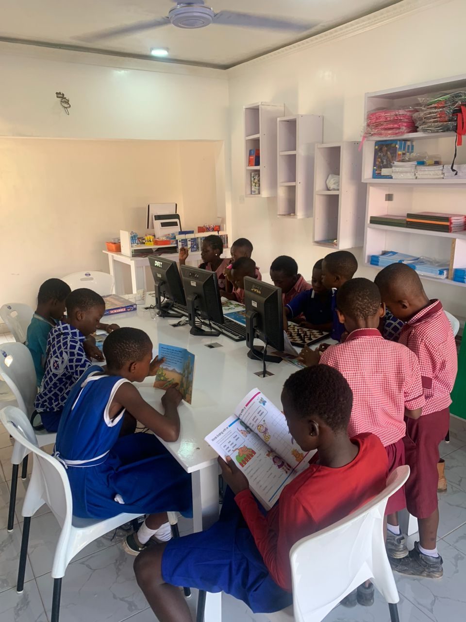 Children reading books together at the Books for Thought Library in Ghana