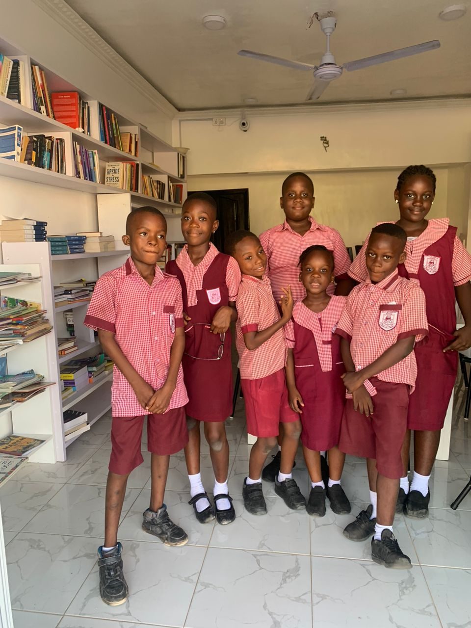 Group of school children smiling at the Books for Thought Library